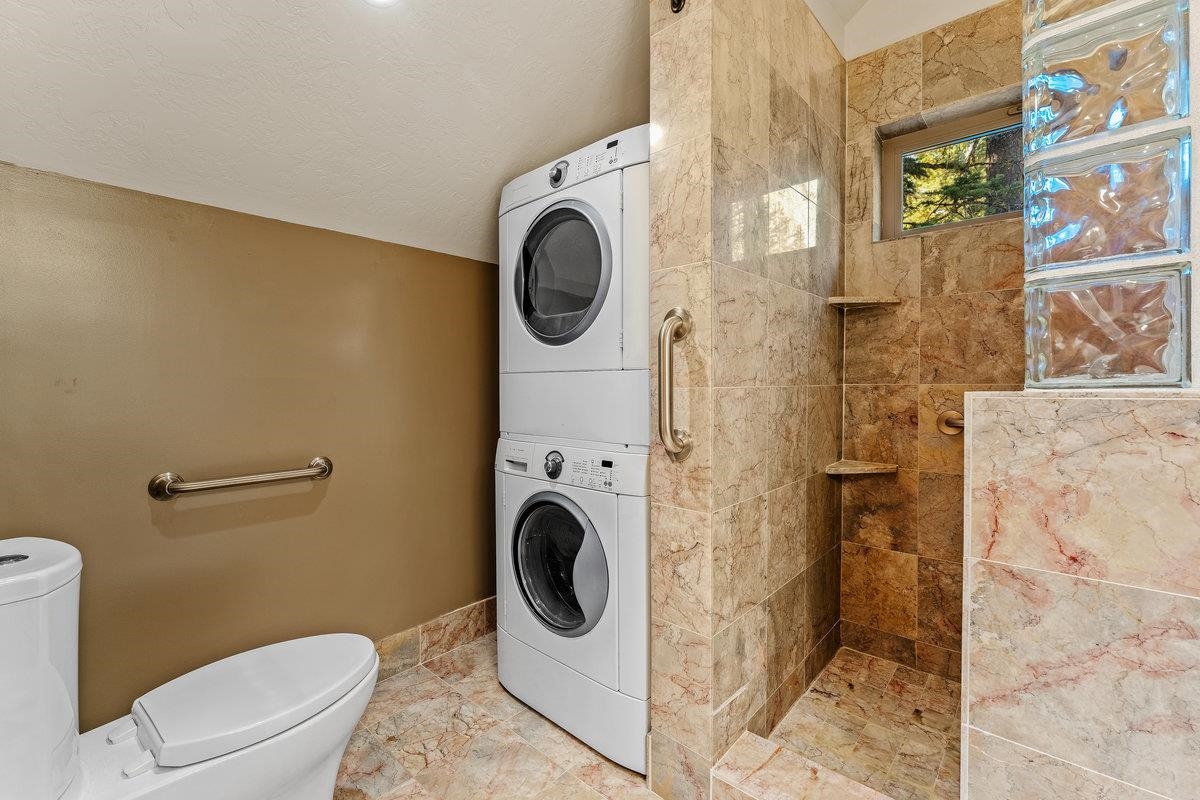 4465 North Ridge Road Carnelian Bay, CA 96140 - Photo 20 of 28 a utility room with dryer and washer