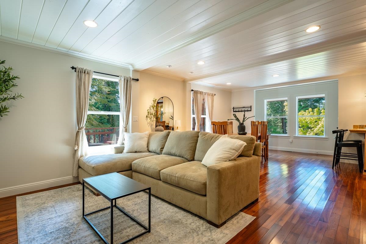 4465 North Ridge Road Carnelian Bay, CA 96140 - Photo 2 of 28 a living room with furniture and a large window