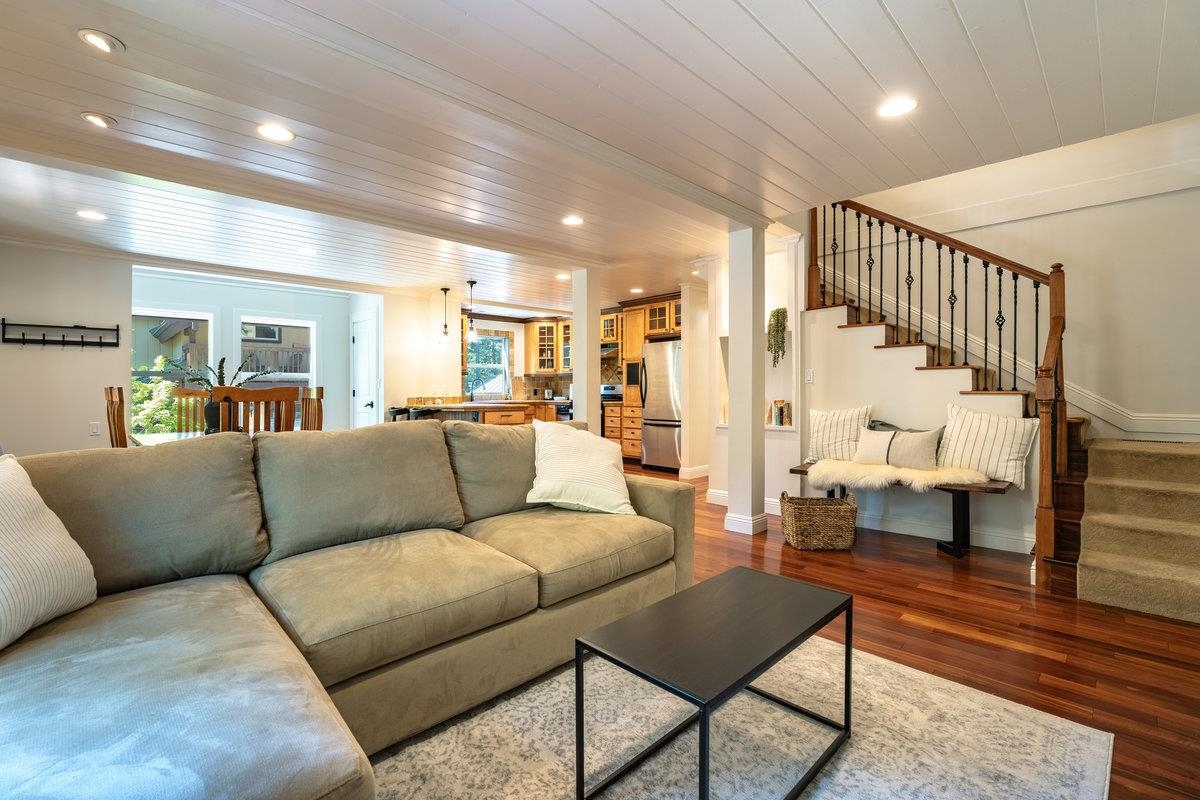 4465 North Ridge Road Carnelian Bay, CA 96140 - Photo 3 of 28 a living room with furniture or wooden floor and a table