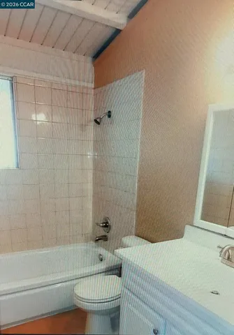 a bathroom with a toilet