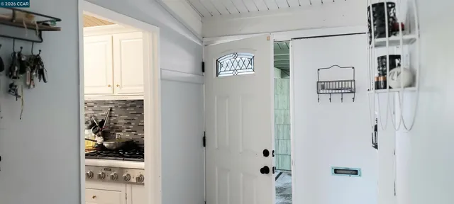 a kitchen with sink cabinets and window