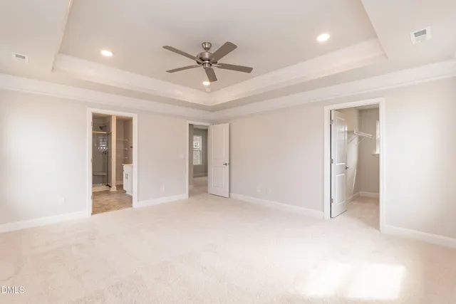 a house view with swimming pool in front of it