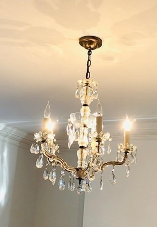 22 Hidden Road Andover, MA 01810 - Photo 34 of 41 a bathroom with a chandelier fan and a chandelier