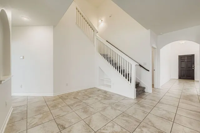 a view of entryway and hall with a window