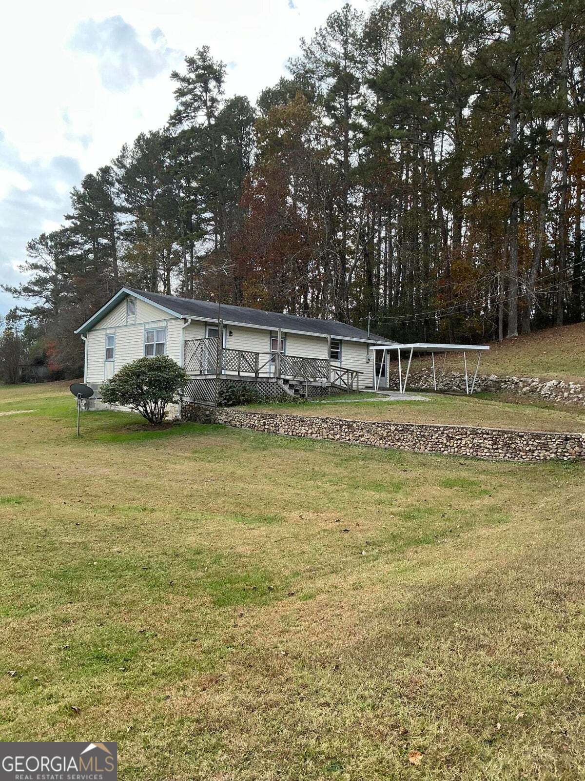 5062 B Highway Rock Spring, GA 30739 - Photo 1 of 19 a view of residential houses with outdoor space and trees