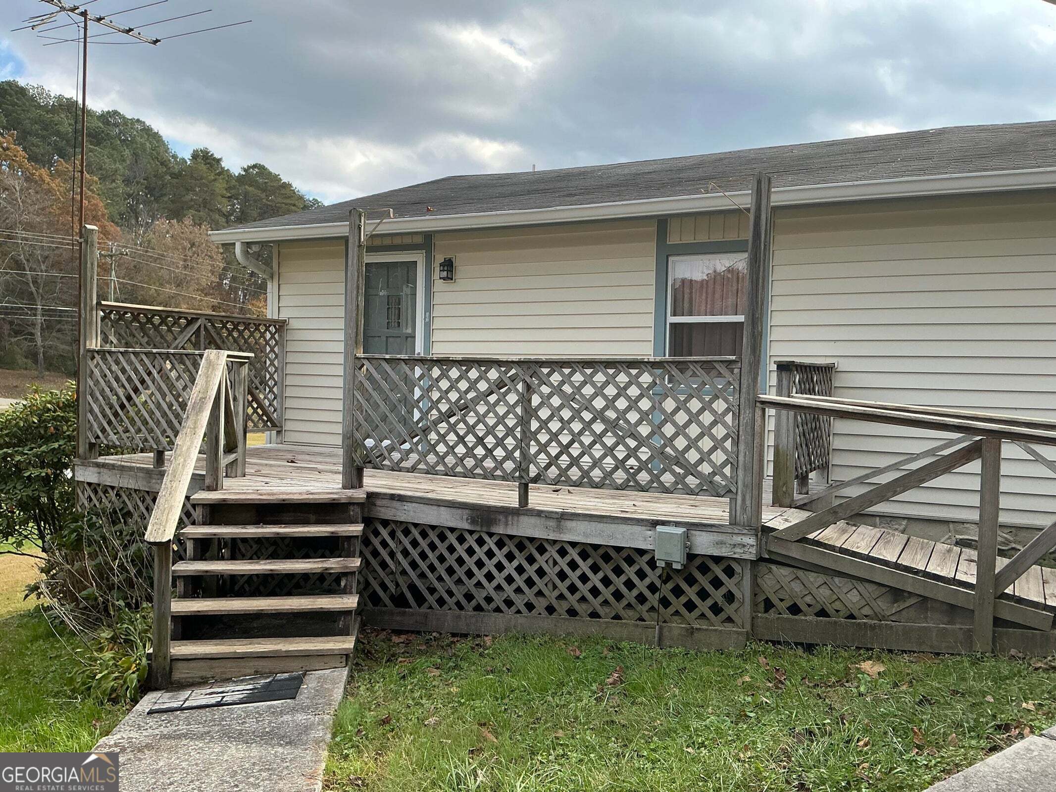 5062 B Highway Rock Spring, GA 30739 - Photo 19 of 19 a front view of a house with a garden