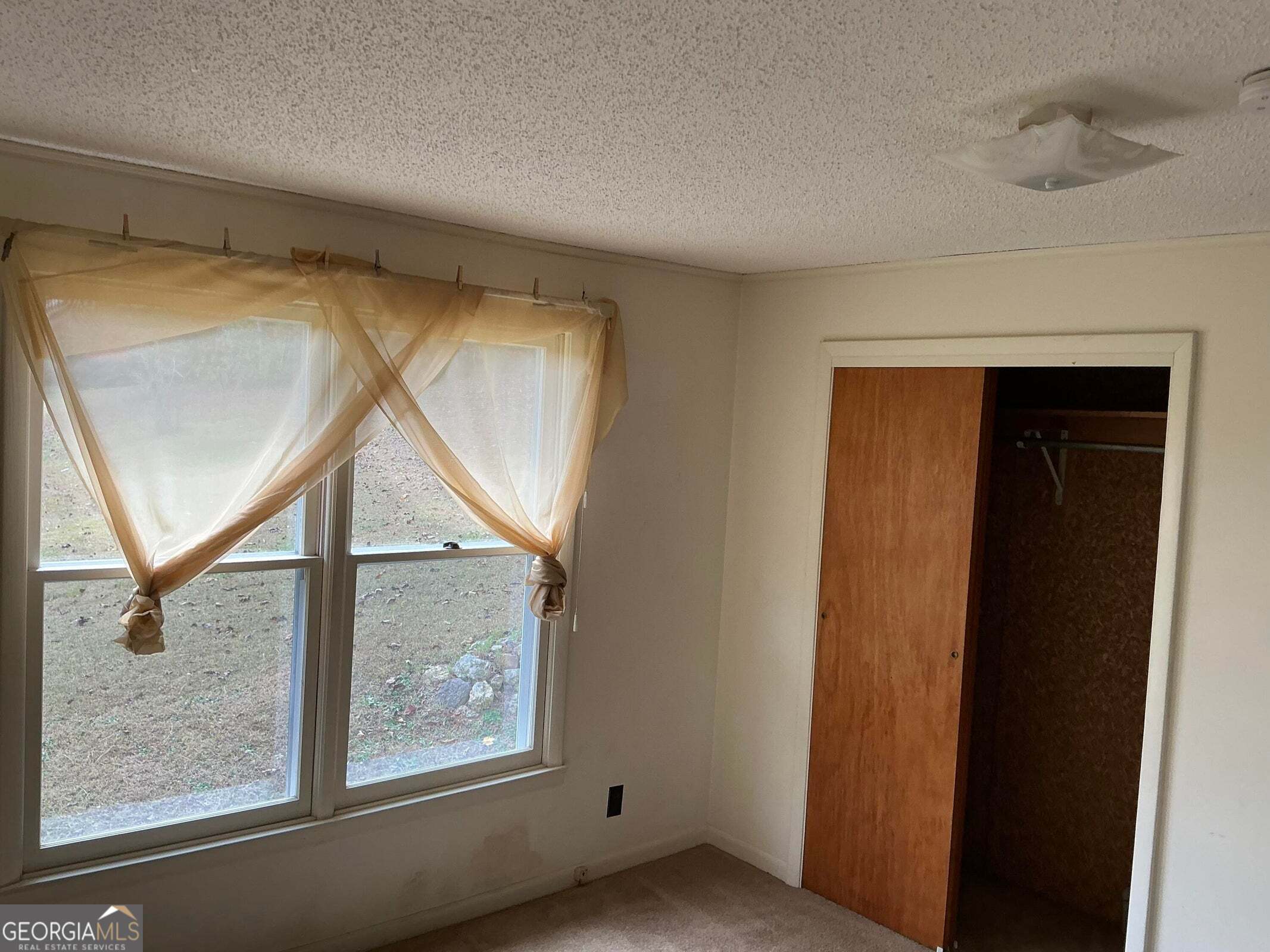 5062 B Highway Rock Spring, GA 30739 - Photo 8 of 19 a view of staircase with a rug