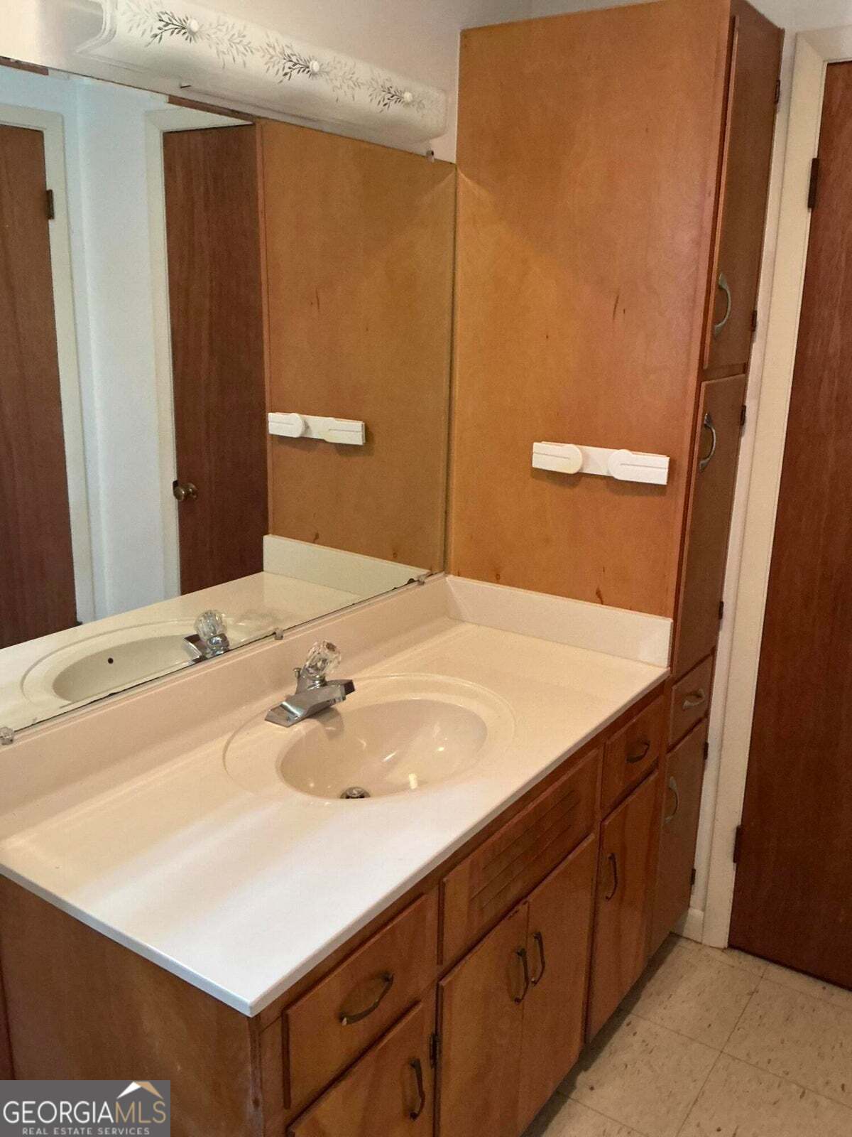 5062 B Highway Rock Spring, GA 30739 - Photo 10 of 19 a bathroom with a sink and a mirror