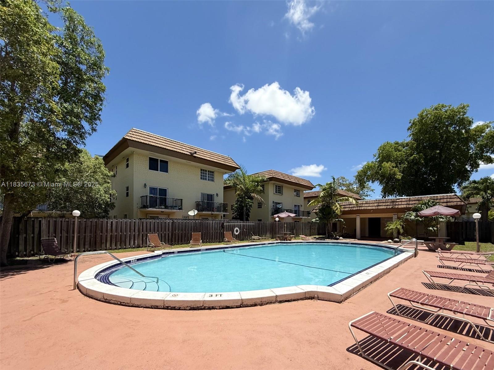 8650 Southwest 109th Avenue, Unit 3112 Miami, FL 33173 - Photo 36 of 38 Community Pool and Lounging Area View