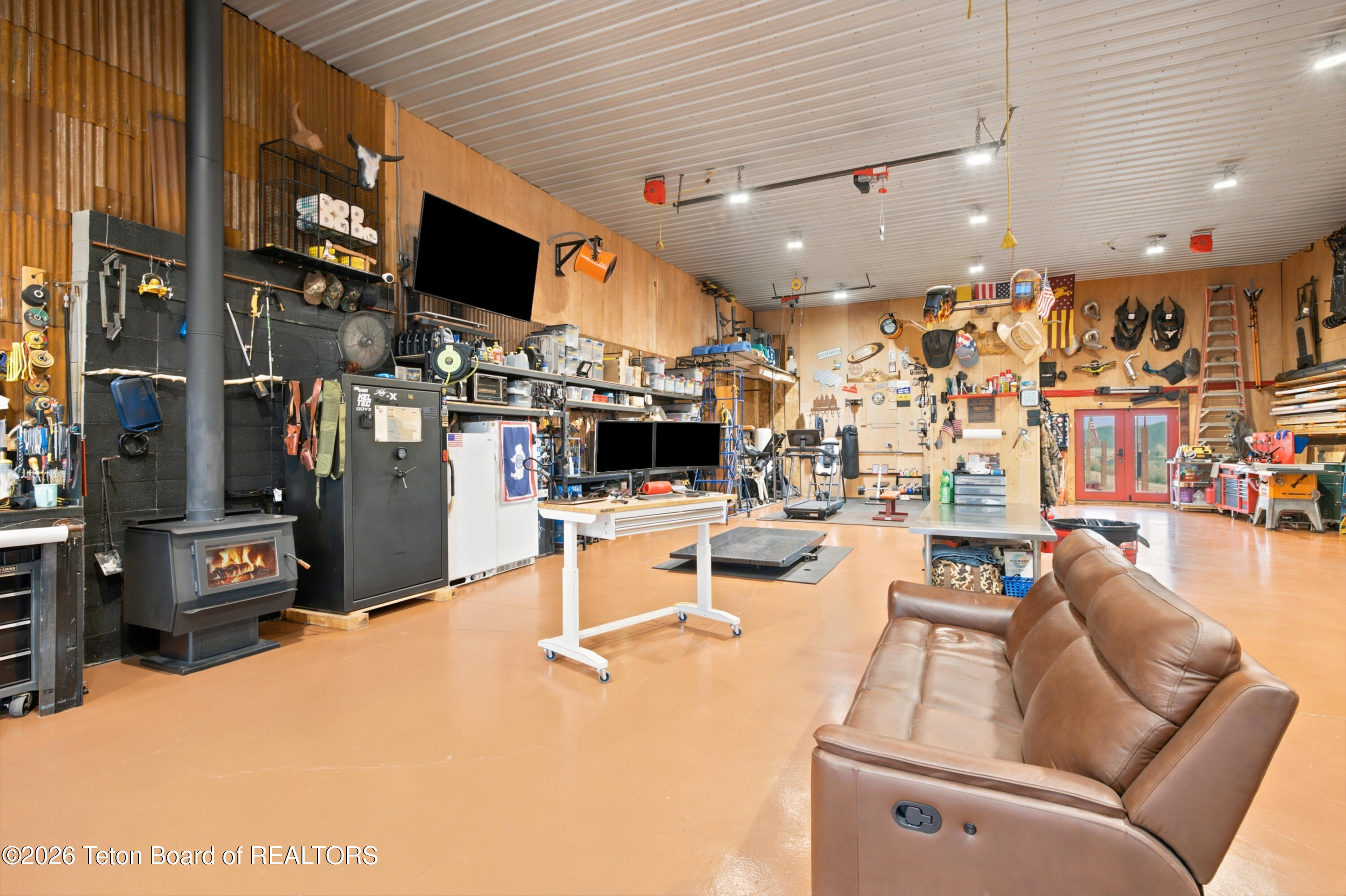 2490 La Bonte Road Jackson, WY 83001 - Photo 50 of 58 43.7_Woodstove and Sofa