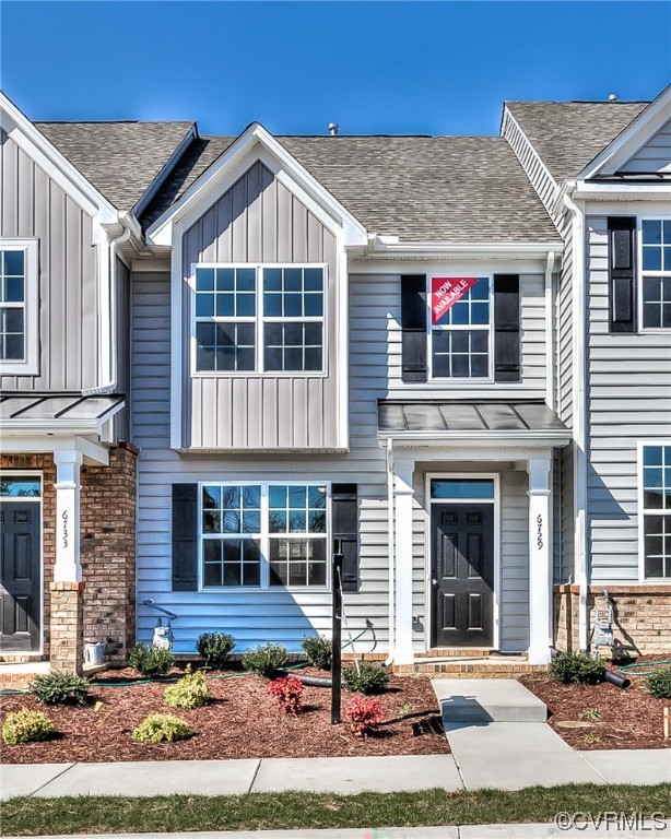 6173 Belay Drive Richmond, VA 23234 - Photo 2 of 17 a front view of a house with garden