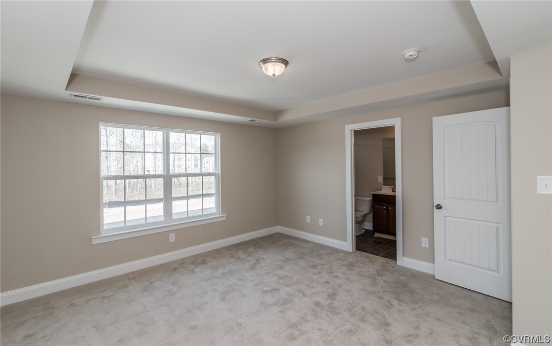 6173 Belay Drive Richmond, VA 23234 - Photo 9 of 17 an empty room with windows and closet
