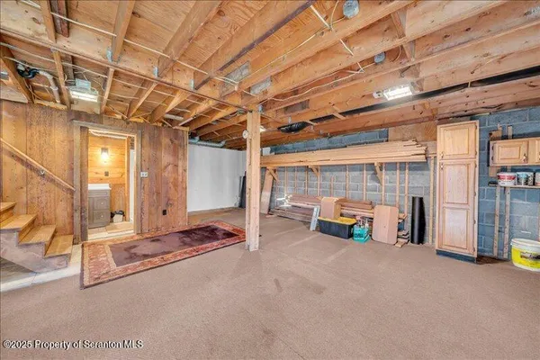 a view of a park with iron fence