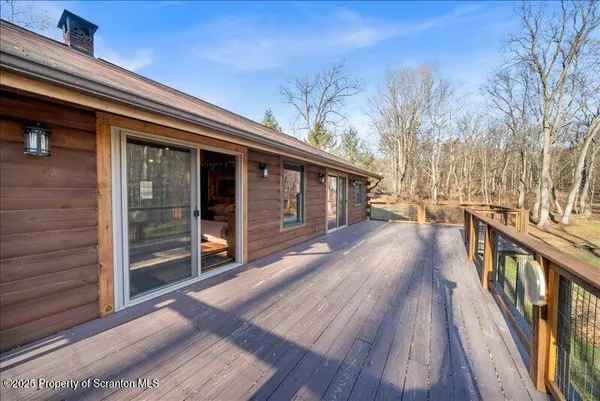 a house with trees in the background