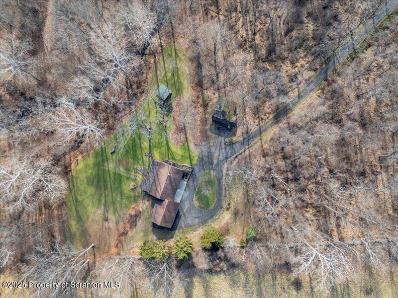 1338 Whites Ferry Road Falls, PA 18615 - Photo 35 of 46 a backyard of a house with lots of green space