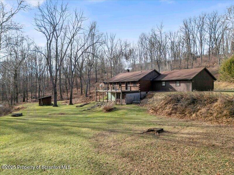 1338 Whites Ferry Road Falls, PA 18615 - Photo 37 of 46 a view of a house with a yard