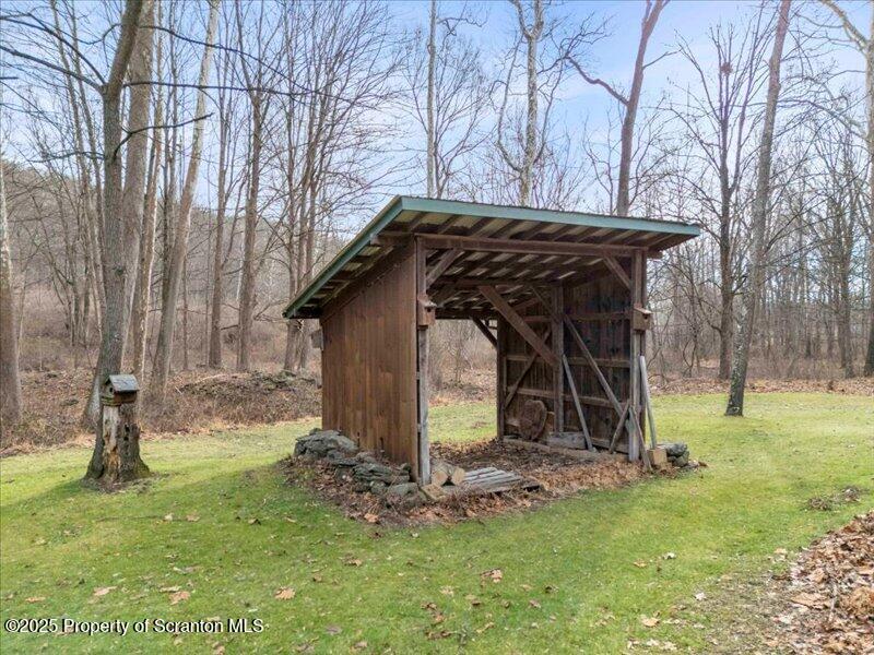 1338 Whites Ferry Road Falls, PA 18615 - Photo 40 of 46 a view of backyard with wooden fence