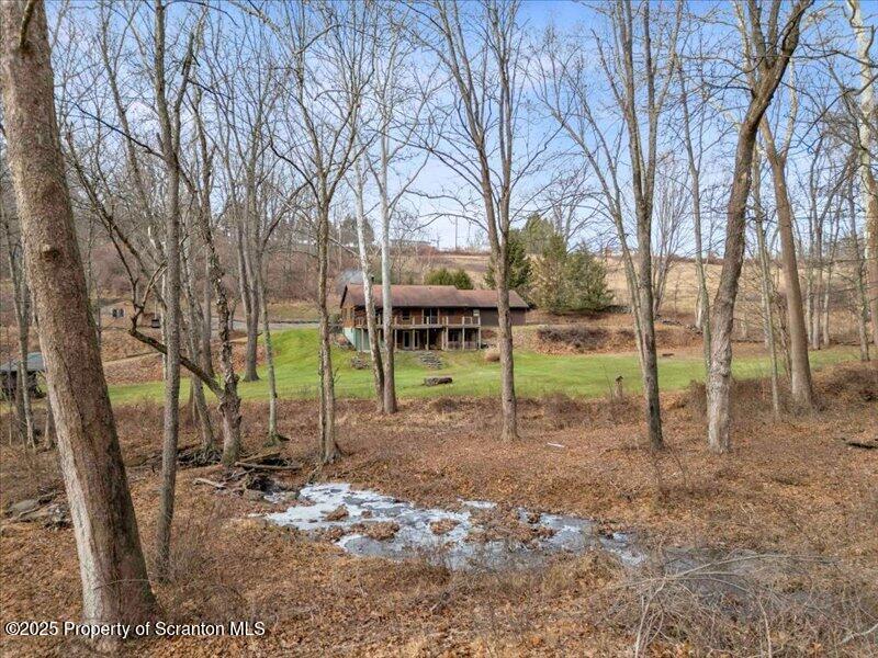 1338 Whites Ferry Road Falls, PA 18615 - Photo 43 of 46 a view of a house with a backyard