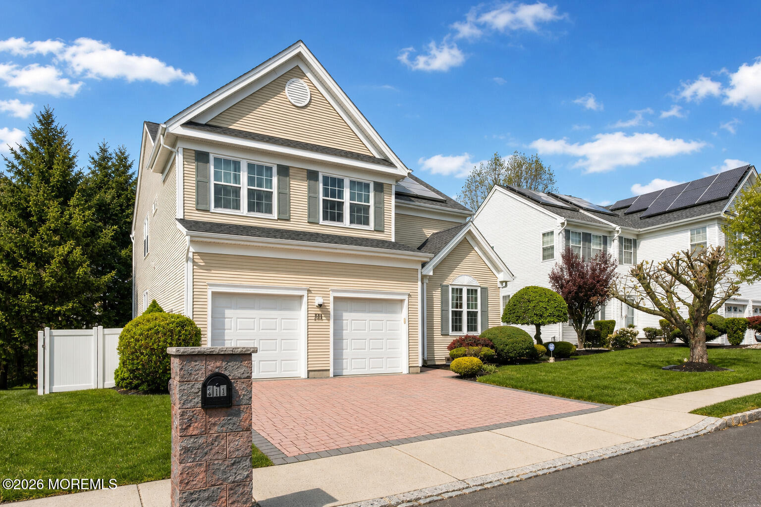 315 Wedgewood Road Morganville, NJ 07751 - Photo 2 of 37 a front view of a house with a yard