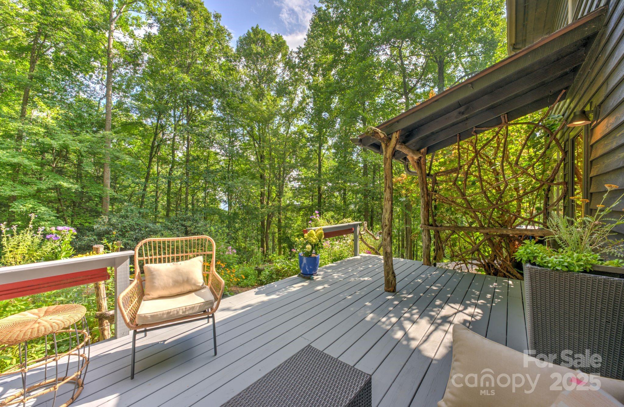 48 Black Oak Forest Road Fairview, NC 28730 - Photo 11 of 48 a view of a two chairs in the balcony