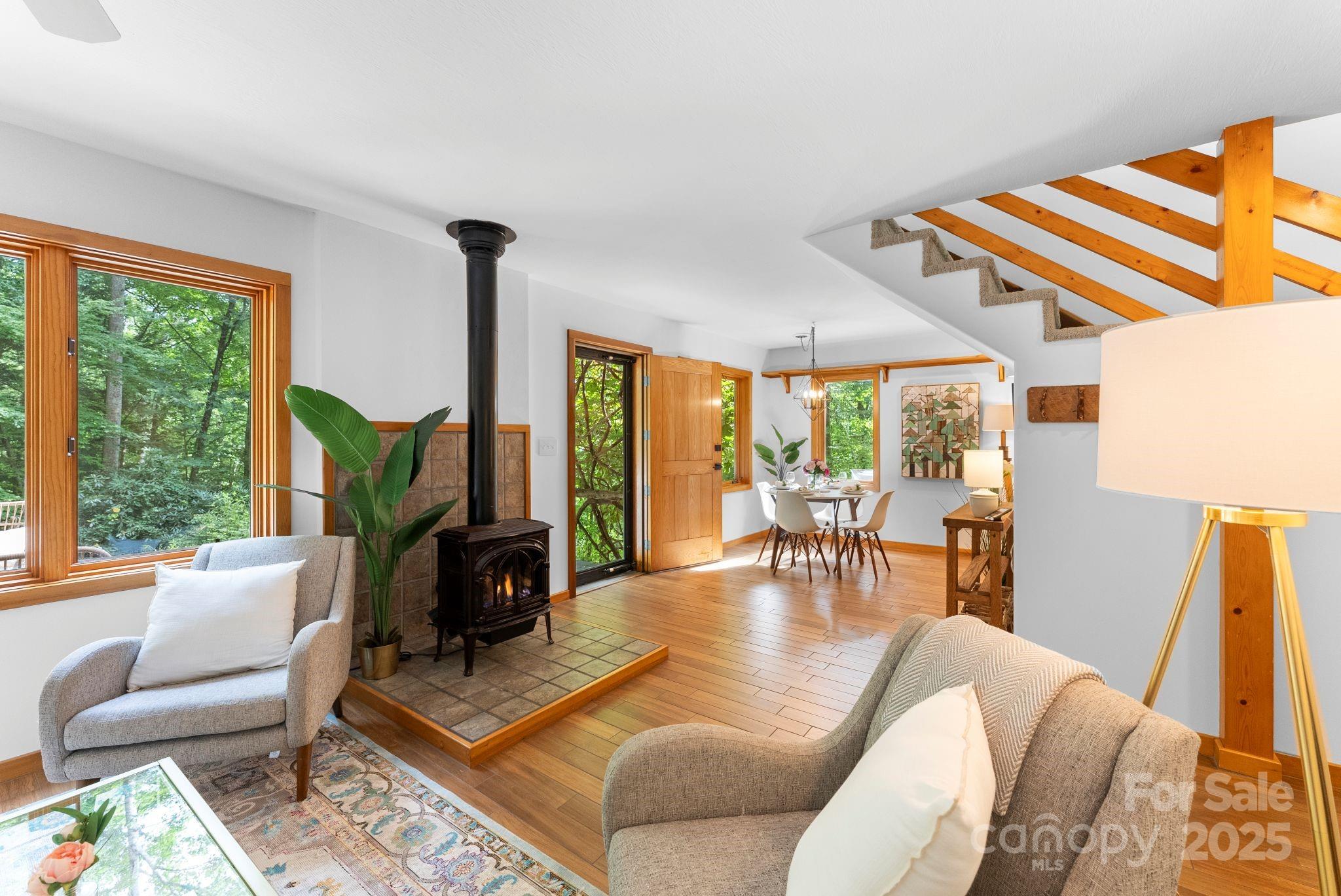 48 Black Oak Forest Road Fairview, NC 28730 - Photo 14 of 48 a living room with furniture and a table