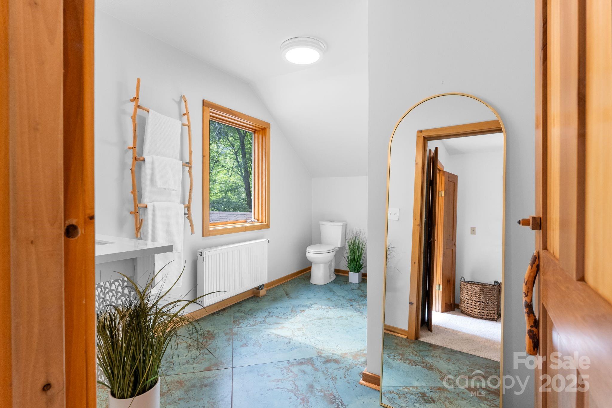 48 Black Oak Forest Road Fairview, NC 28730 - Photo 30 of 48 a view of an entryway with wooden floor