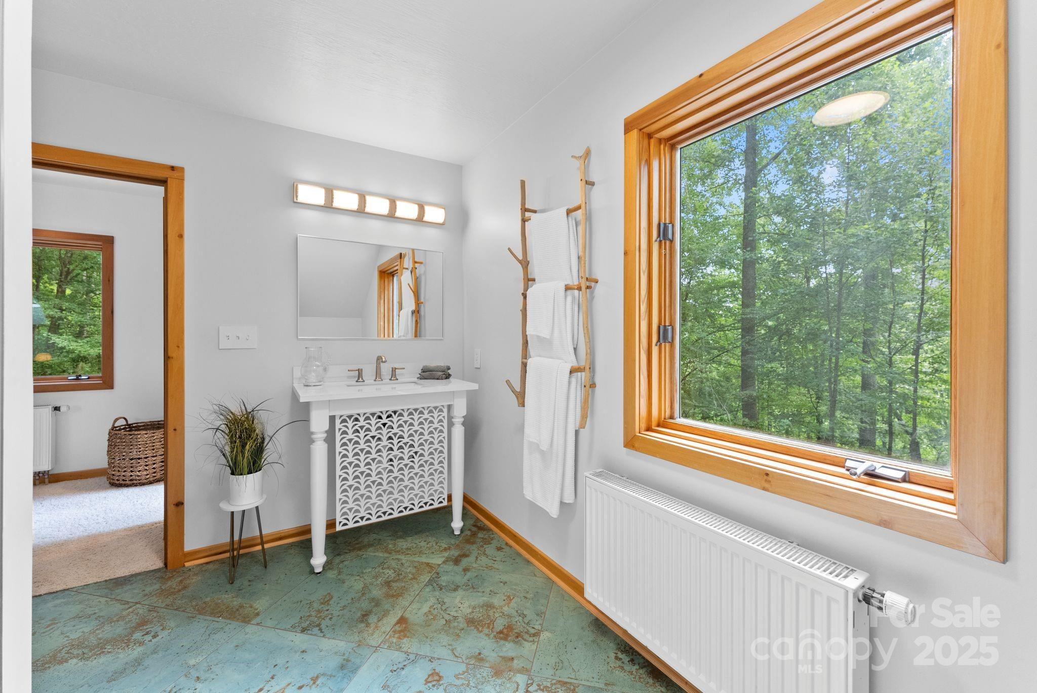 48 Black Oak Forest Road Fairview, NC 28730 - Photo 32 of 48 a view of a hallway with windows and entryway