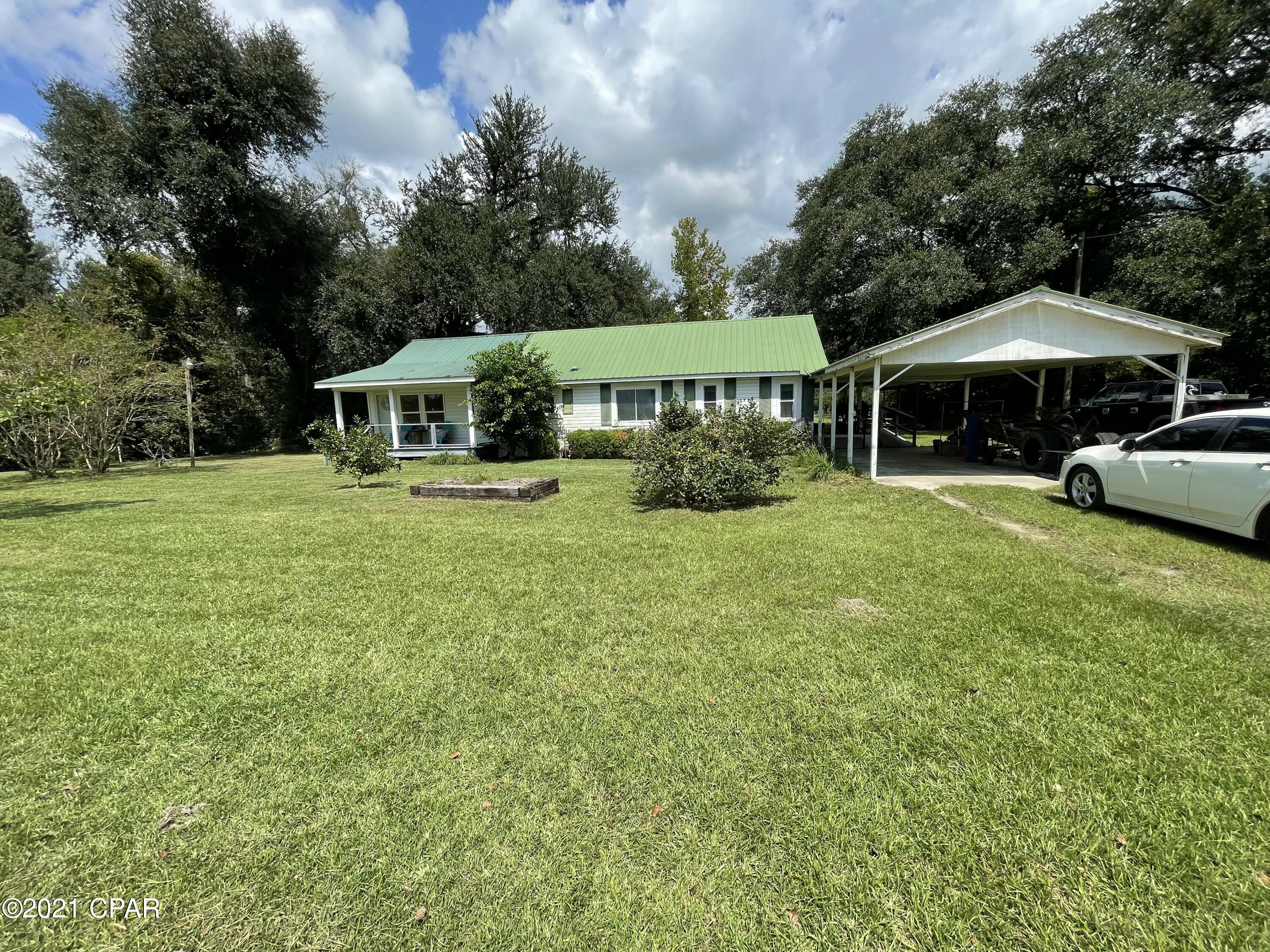 6818 Bateau Pond Road Grand Ridge, FL 32442 - Photo 3 of 34