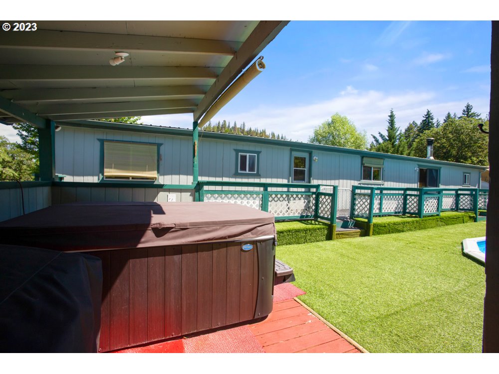 890 Crowfoot Road Eagle Point, OR 97524 - Photo 16 of 48 a view of a house with a swimming pool
