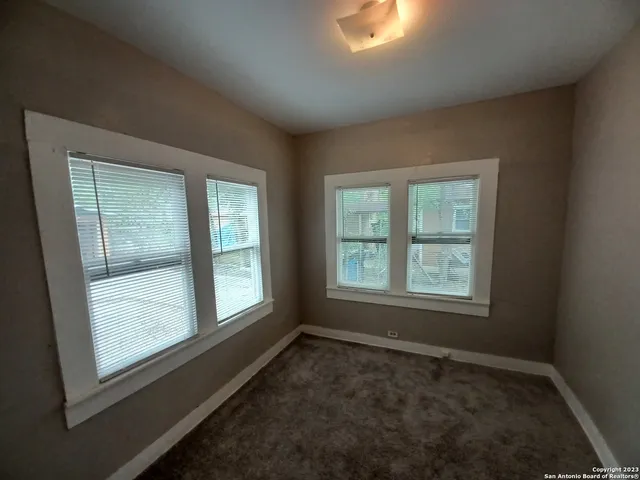 an empty room with a window
