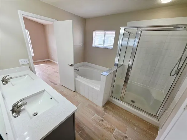 a bathroom with a sink and a tub