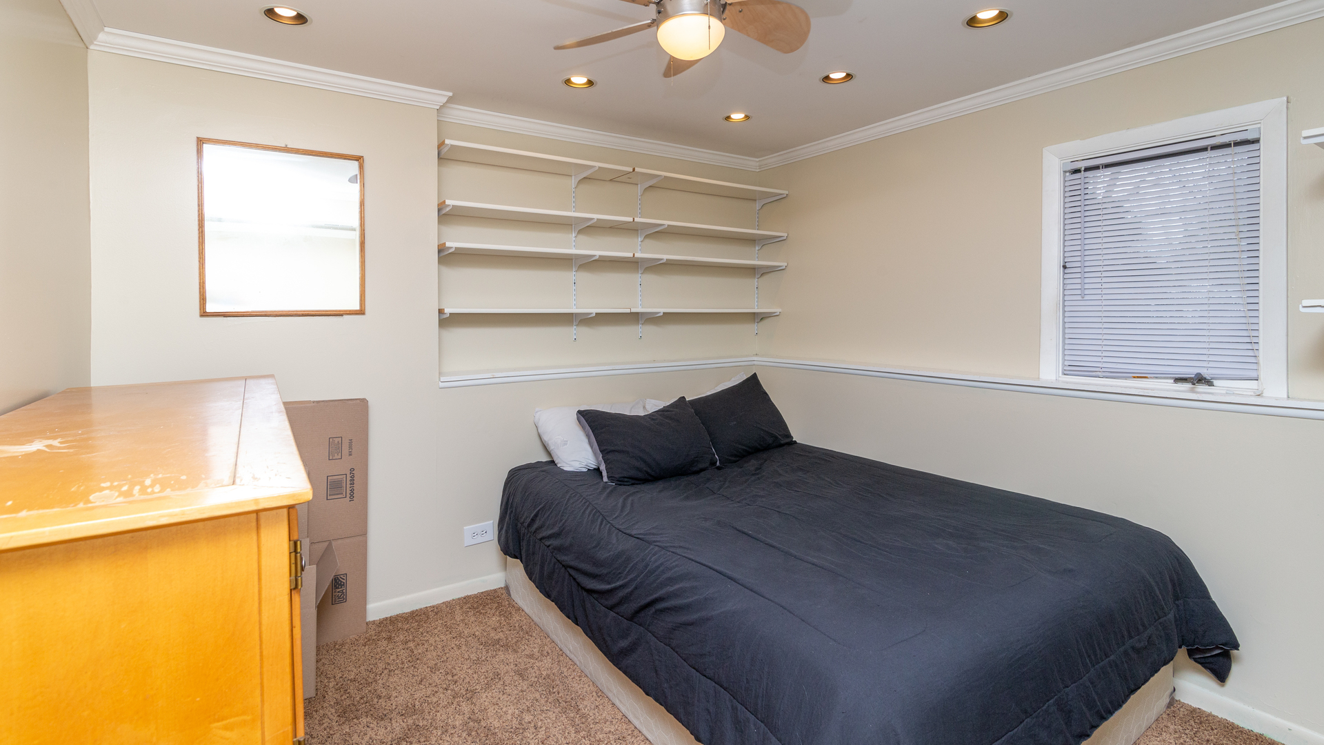 400 Frederick Lane Hoffman Estates, IL 60169 - Photo 16 of 34 a bedroom with a bed and a cabinets