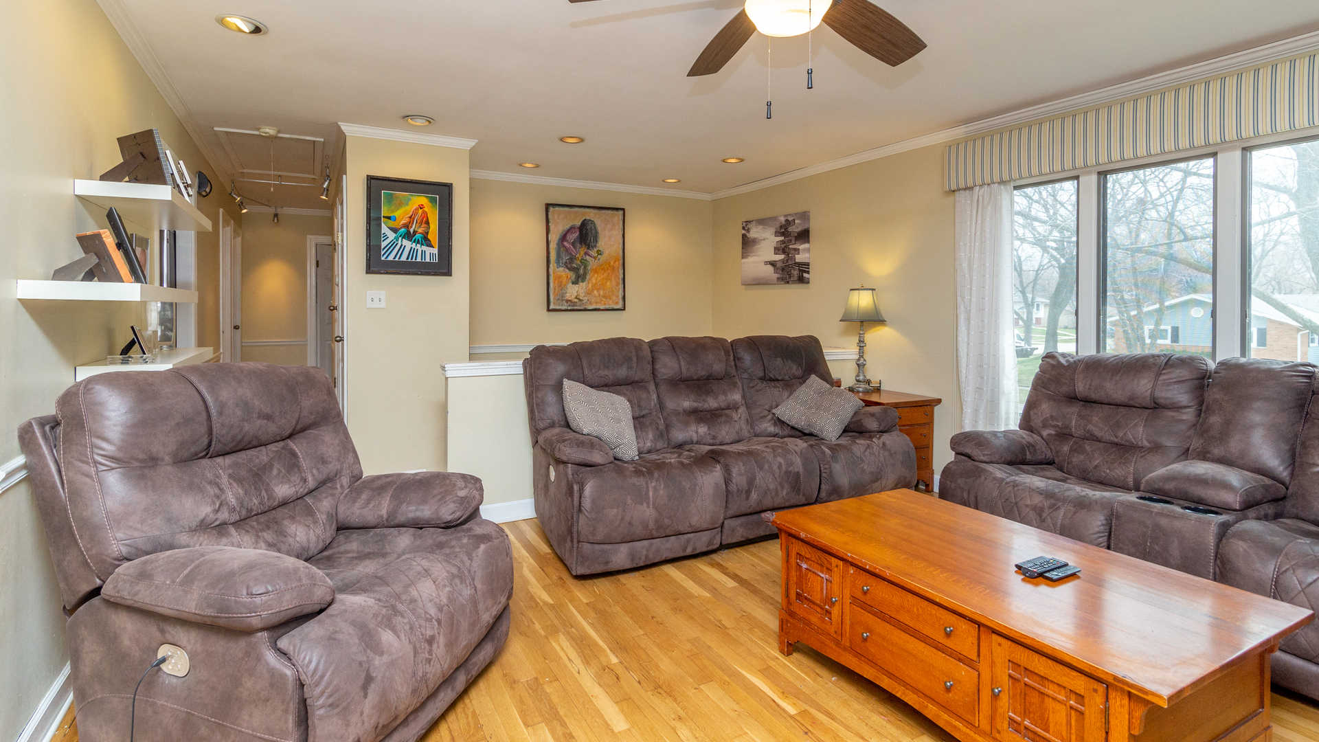 400 Frederick Lane Hoffman Estates, IL 60169 - Photo 3 of 34 a living room with furniture and a large window