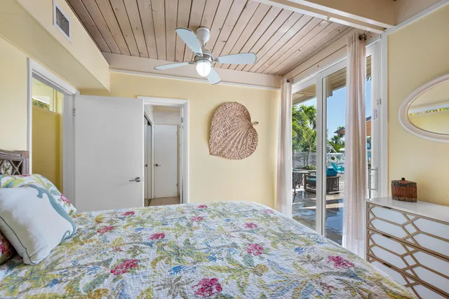 a bathroom with a toilet and shower