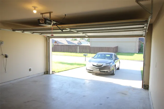 a view of a house with backyard and porch