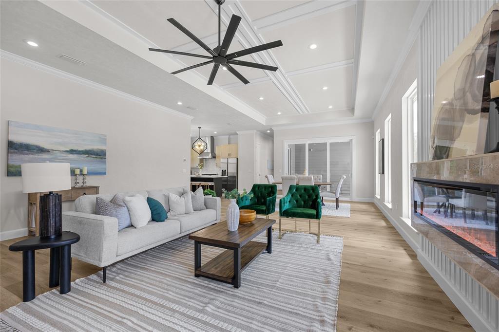 13425 Southwest 9th Road Newberry, FL 32669 - Photo 13 of 37 a living room with furniture and a wooden floor