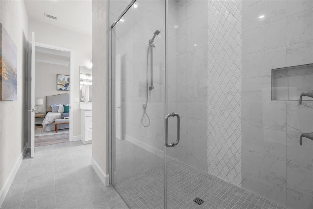 13425 Southwest 9th Road Newberry, FL 32669 - Photo 26 of 37 a bathroom with a shower and a sink