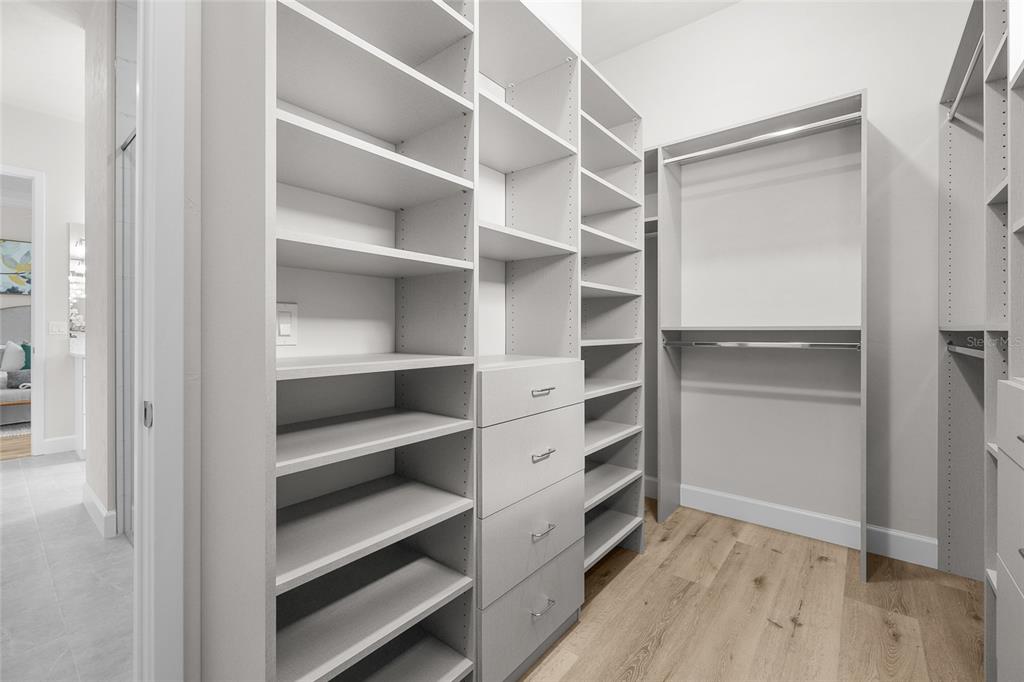 13425 Southwest 9th Road Newberry, FL 32669 - Photo 27 of 37 a view of walk in closet with empty racks