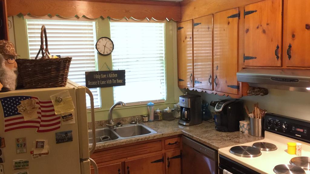 111 North Main Street Springfield, TN 37172 - Photo 17 of 25 a kitchen with a sink and a stove