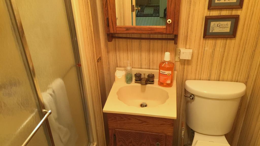 111 North Main Street Springfield, TN 37172 - Photo 24 of 25 a bathroom with a sink and a toilet