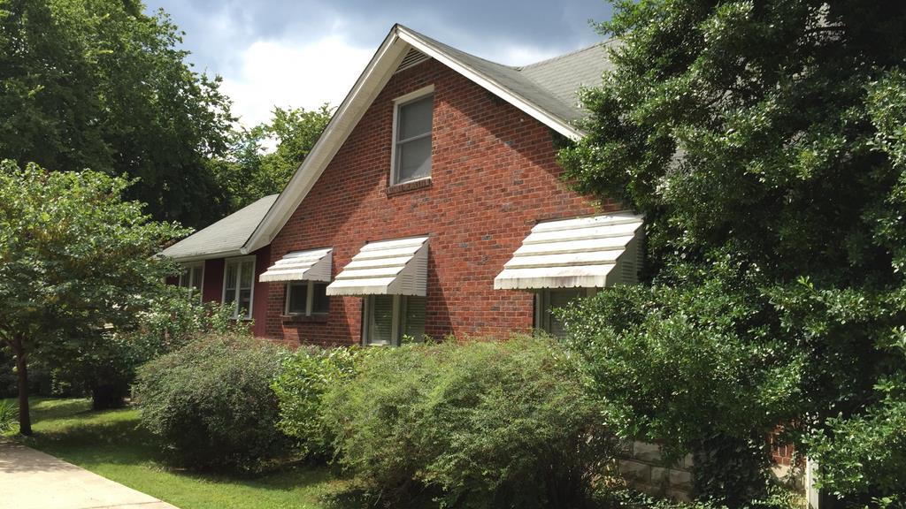 111 North Main Street Springfield, TN 37172 - Photo 8 of 25 a front view of a house with a yard