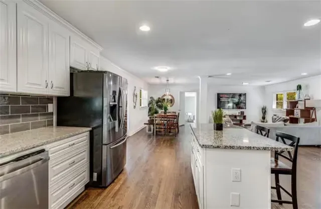 a view of a bedroom from a hallway