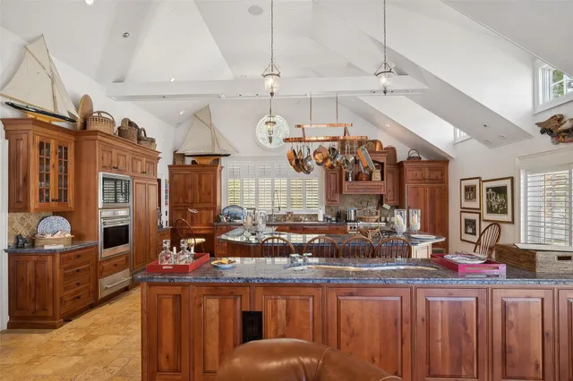 a view of a kitchen and dining area