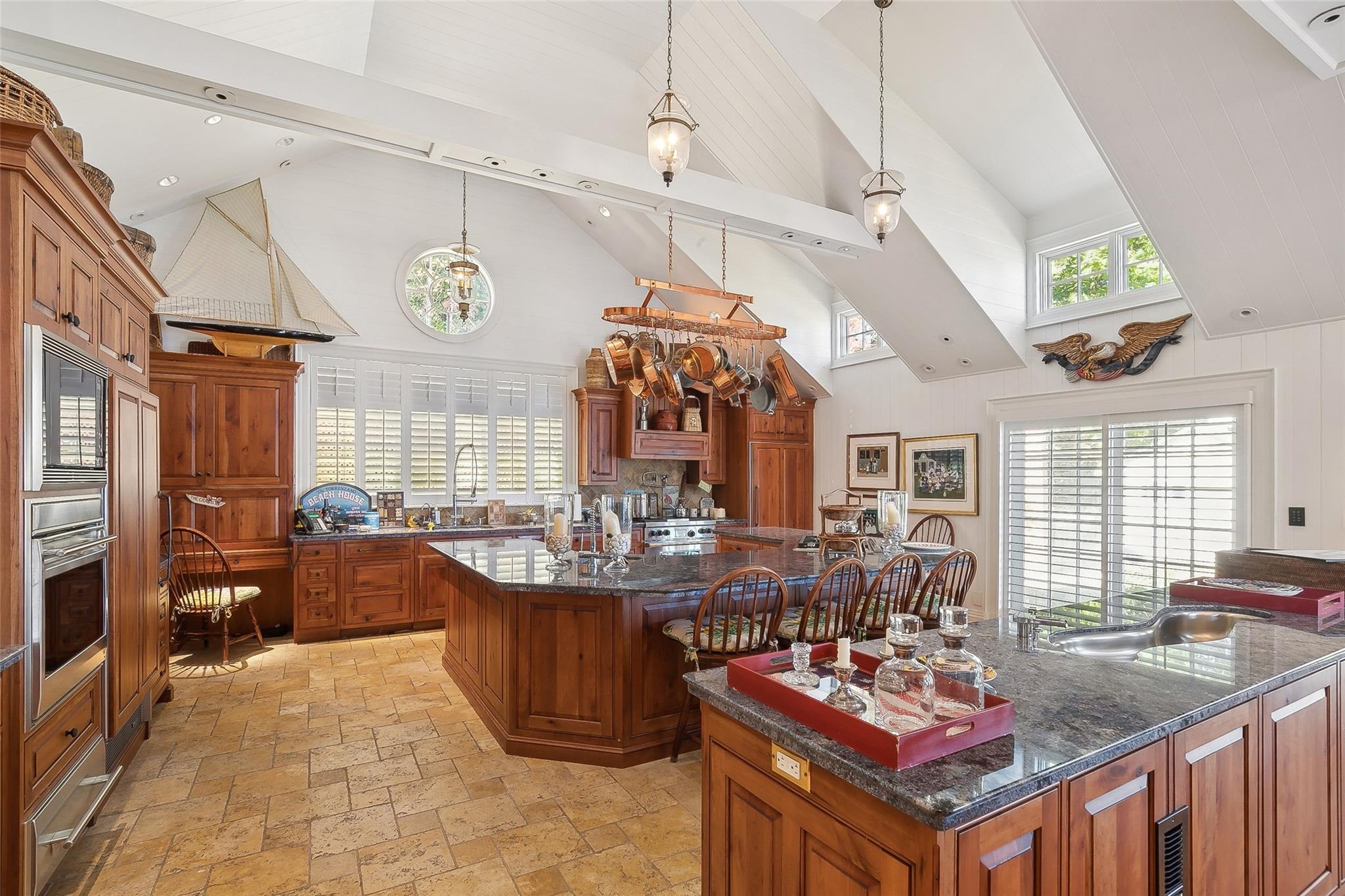 1386 Ridge Road Syosset, NY 11791 - Photo 3 of 11 a view of a kitchen and dining area