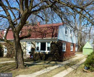723 Nottingham Road Baltimore, MD 21229 - Photo 3 of 27 a view of a house with a yard