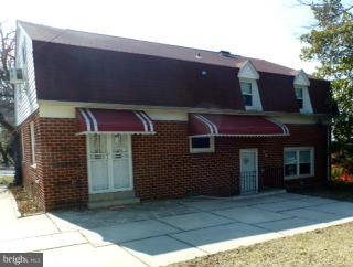 723 Nottingham Road Baltimore, MD 21229 - Photo 21 of 27 a front view of a house with a garage