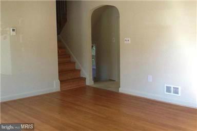 723 Nottingham Road Baltimore, MD 21229 - Photo 9 of 27 a view of entryway with wooden floor