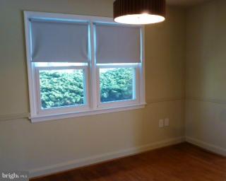 723 Nottingham Road Baltimore, MD 21229 - Photo 10 of 27 an empty room with a window