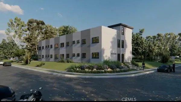 a view of building with yard