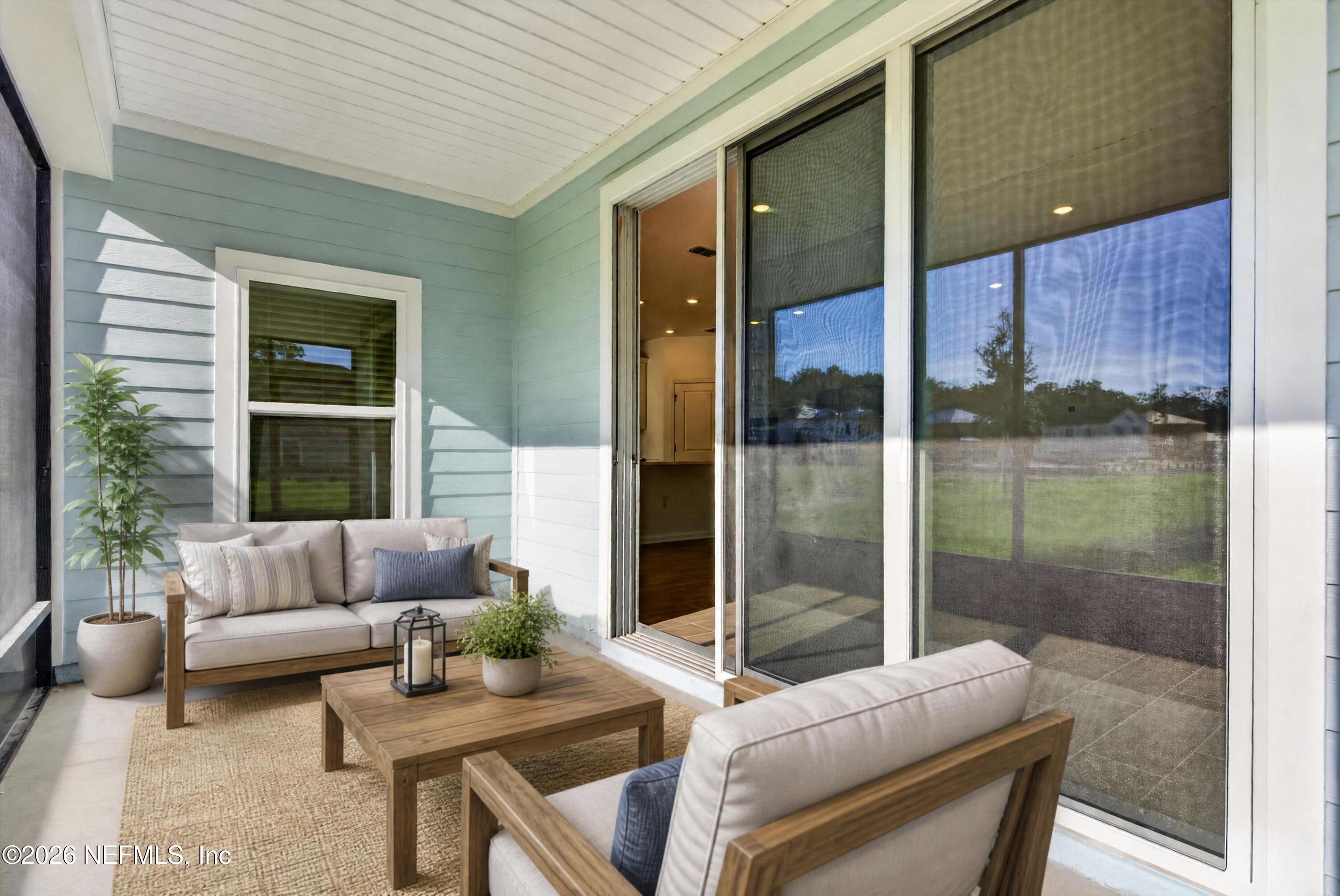 269 Bluegrass Way St. Augustine, FL 32092 - Photo 45 of 62 Virtually staged enclosed patio